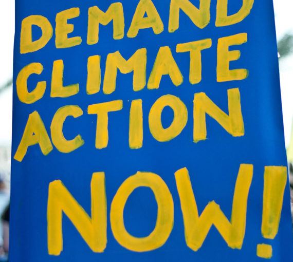 A protest poster demanding for climate action now.