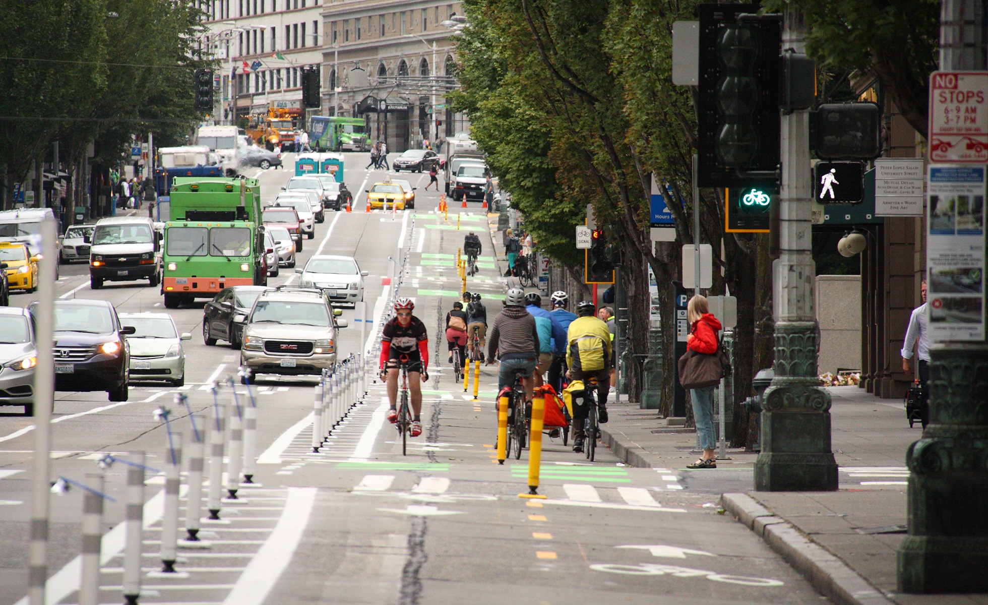 Cyclists use the protected bike lane on Second Avenue in Seattle, Washington.
