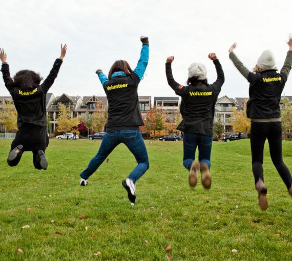 David Suzuki Foundation volunteers jump for joy.