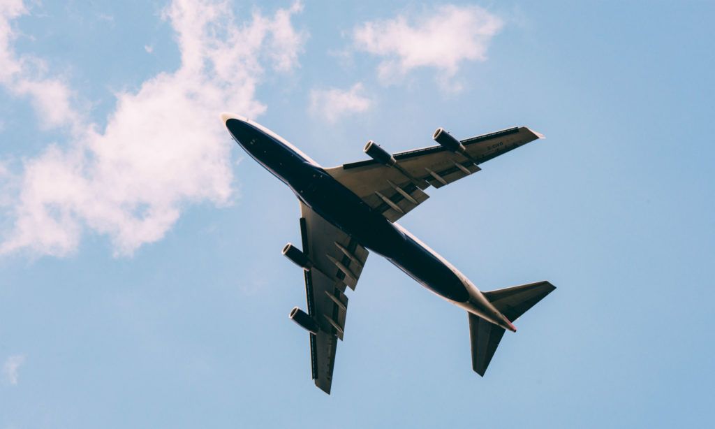 A picture of an airplane taken from the ground