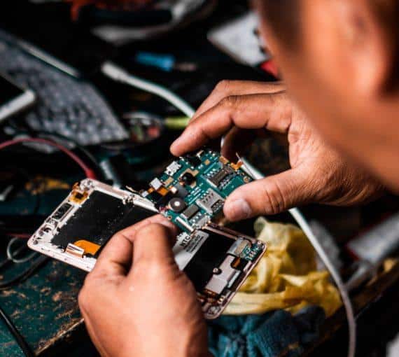 Person repairing electronics