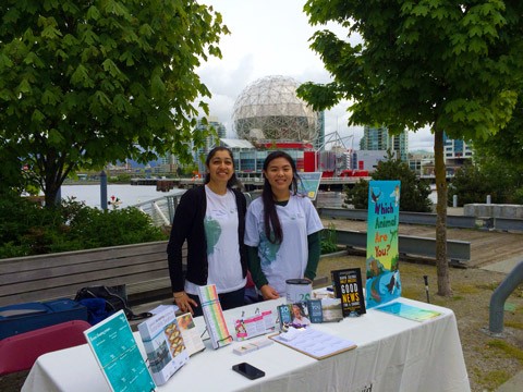 David Suzuki Foundation events booth with two of our volunteers