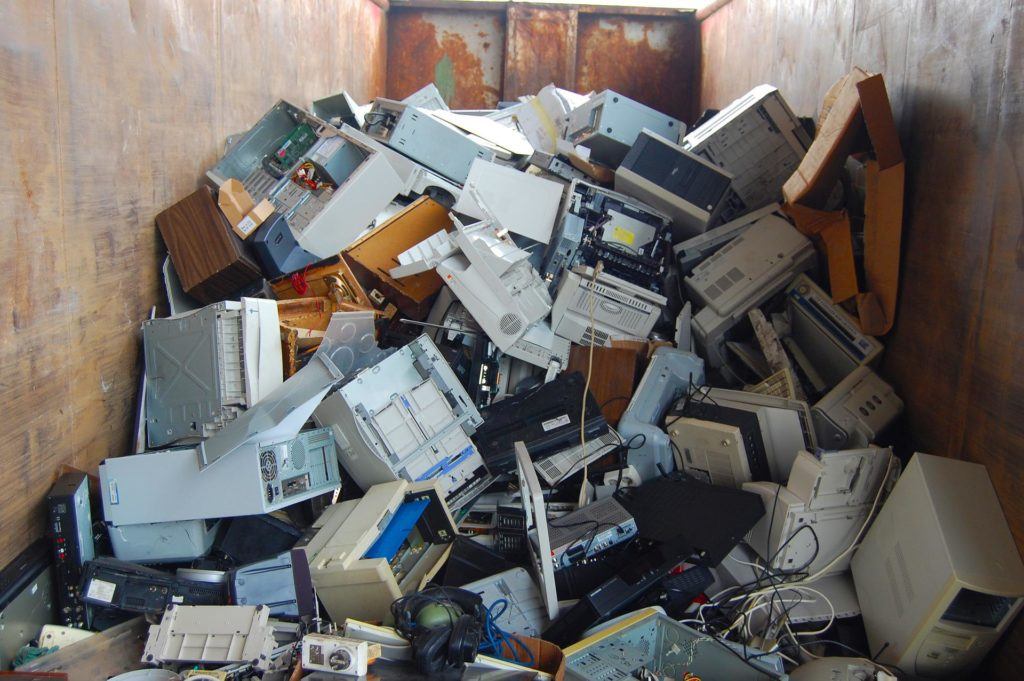 Used electronics waste pile