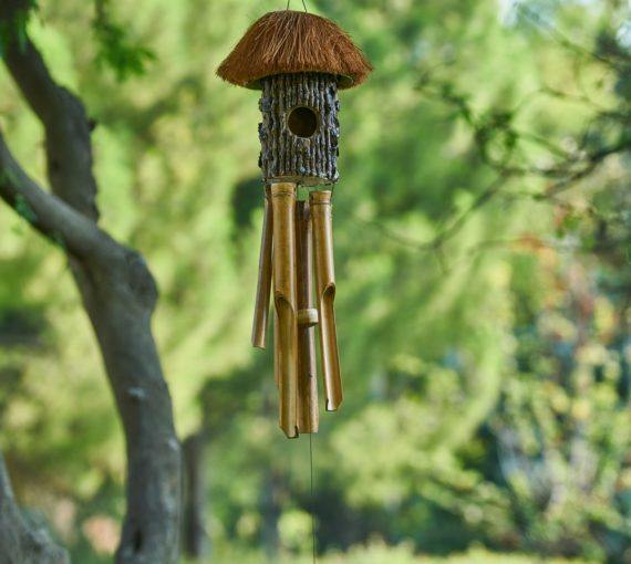 Wind chimes hanging in a tree