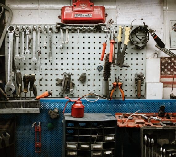 A garage full of tool and equipment clutter.