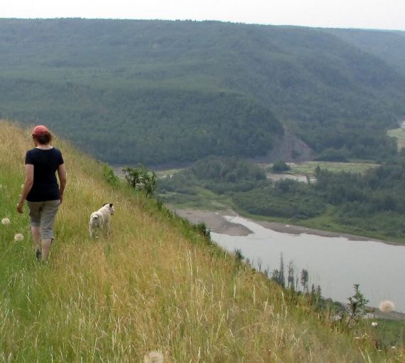 Woman and dog at Site C Dam, Peace River Valley