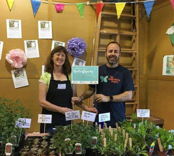 Two Butterflyway Ranger volunteers at a plant sale in Deep Cove, B.C.