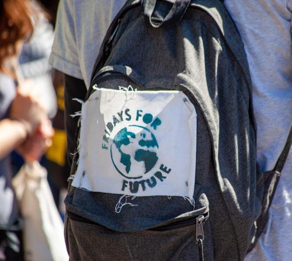 fridays-for-future-canada-youth-climate-movement Youth with Fridays for Future badge on backpack