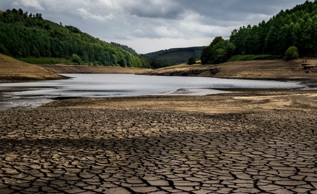 An image showing Derwent Reservoir in the UK dried up after the summer of 2018