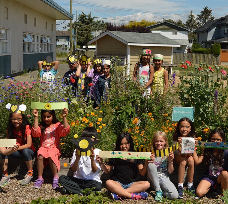 Students at the Daniel Woodward Elementary School butterfly garden