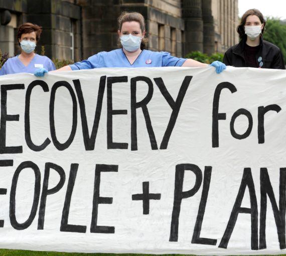 Banner reading Recovery for People + Planet from Scotland demonstration