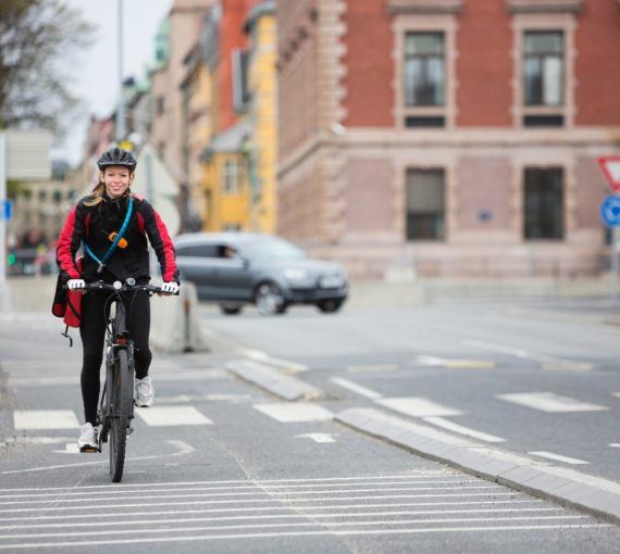 Woman biking in the city