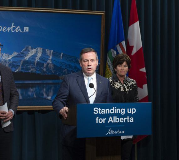Jason Kenney announcing Public Inquiry into Anti-Alberta Energy Campaigns. He is standing in front of a podium that reads 