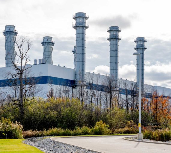 A blue and white power plant in Ontario