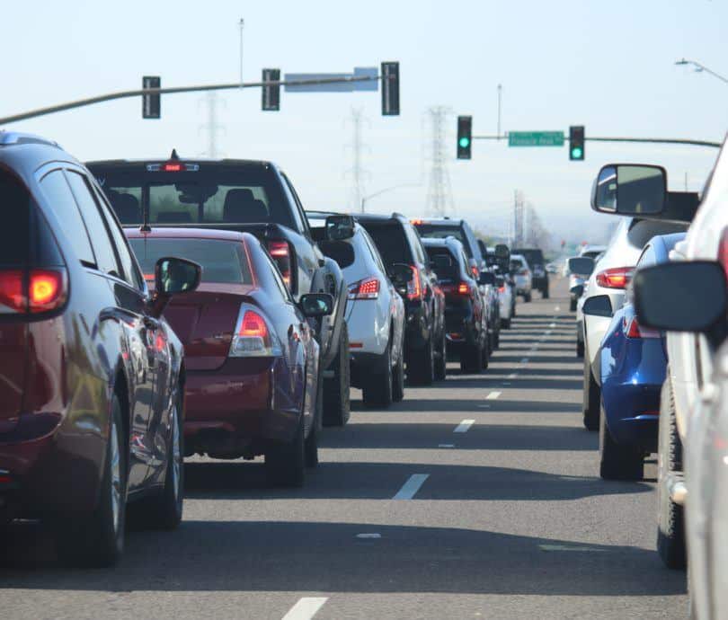 Cars sit in traffic gridlock during the day.