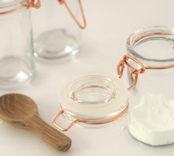 Empty jars and wooden spoon