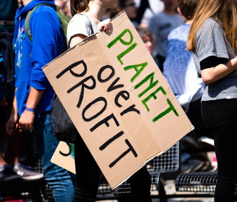 demonstrator holding sign