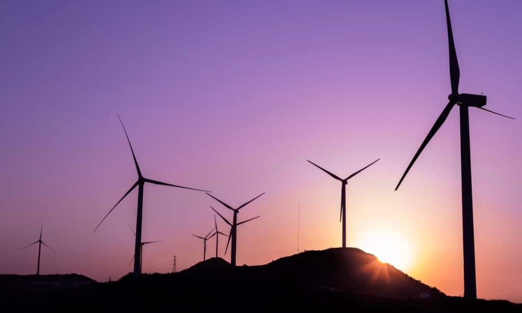 Picture of wind turbines representing the article for the benefits of renewable electricity.