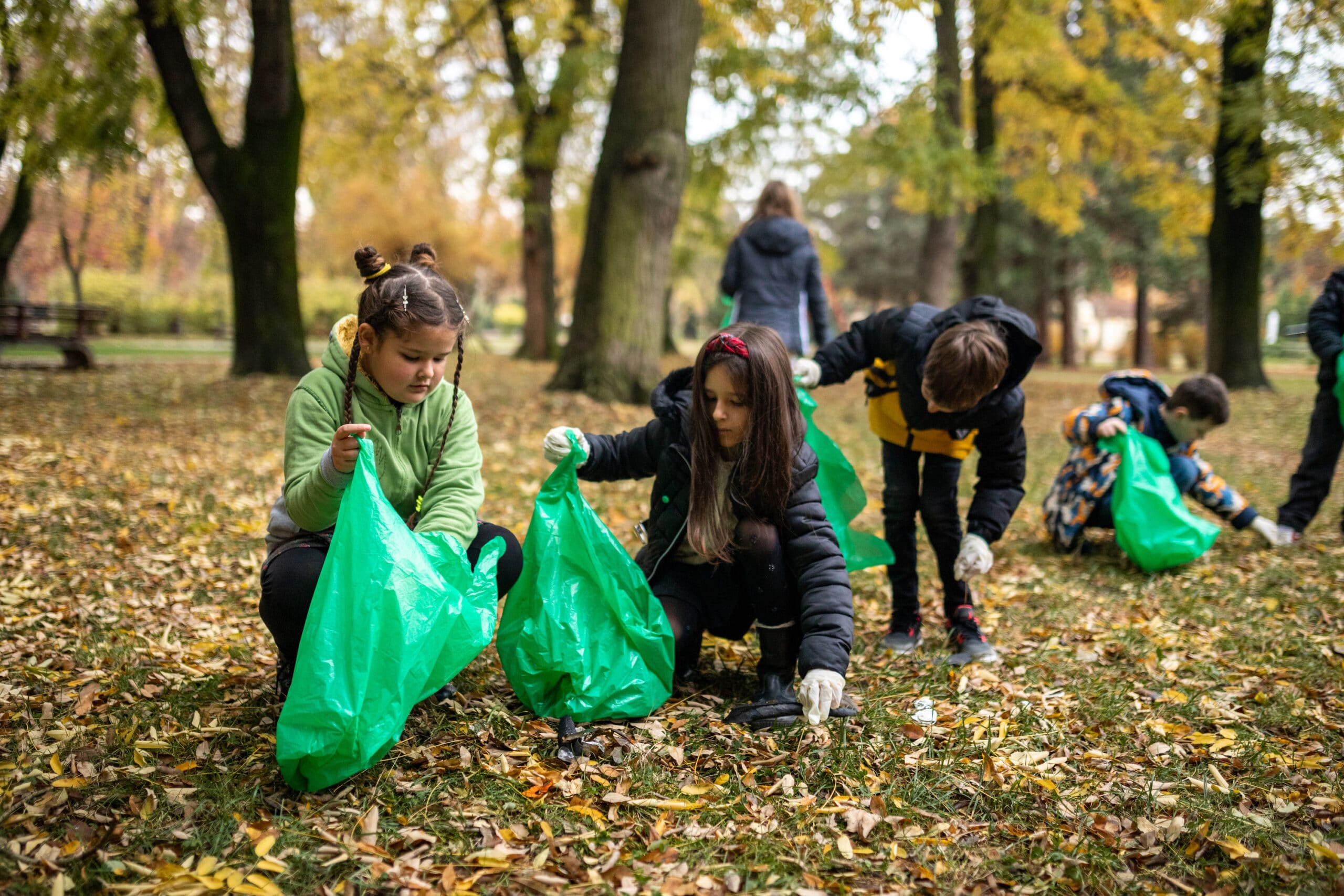 School students collecting litter during a school ground and/or community clean-up. 
