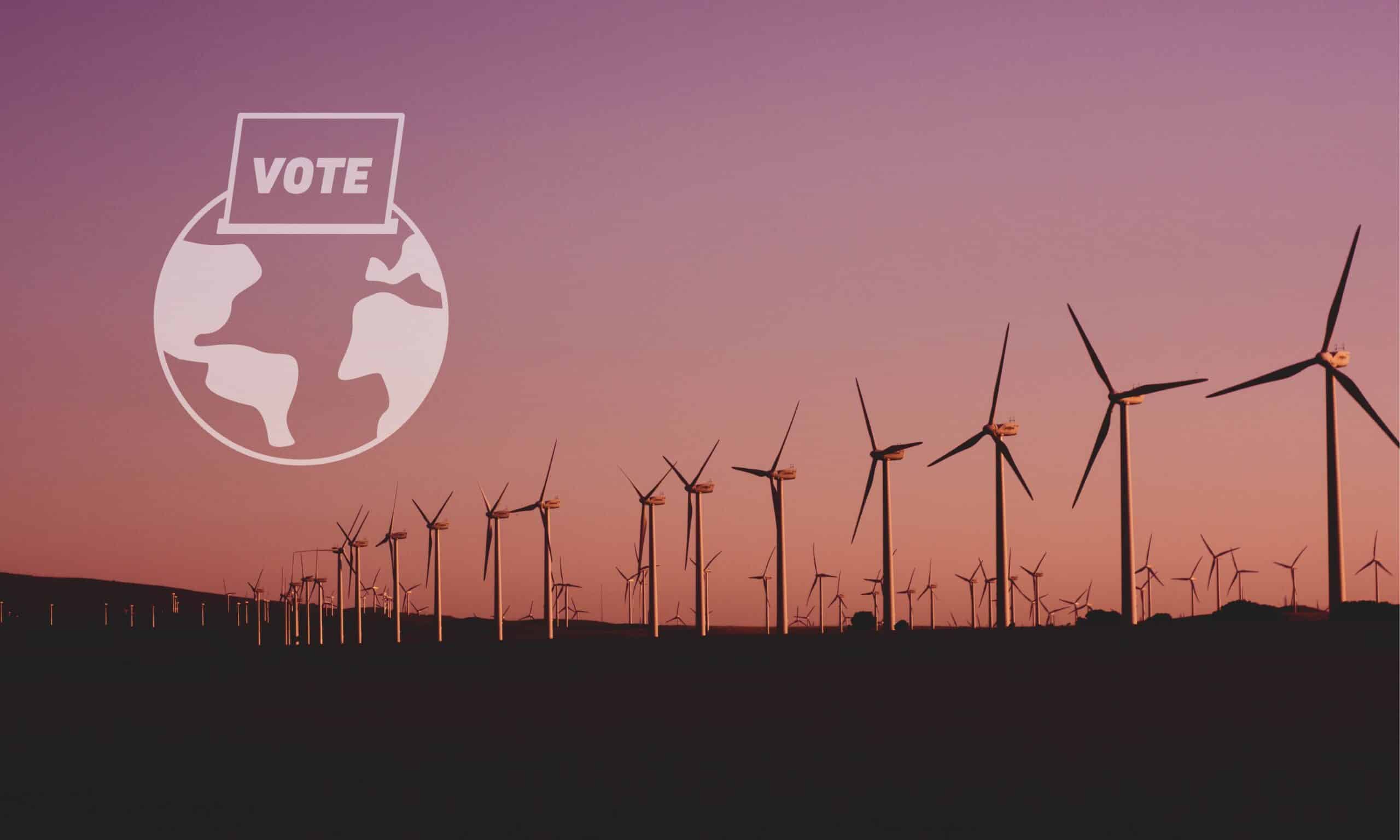 Wind turbines at sunset with a 'vote' icon overlay