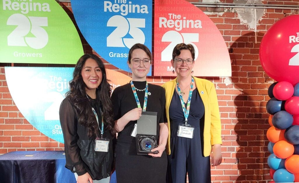 Kimberli Kolody-Watt (centre) with Regina city councillors Victoria Flores and Shanon Zachidniak.