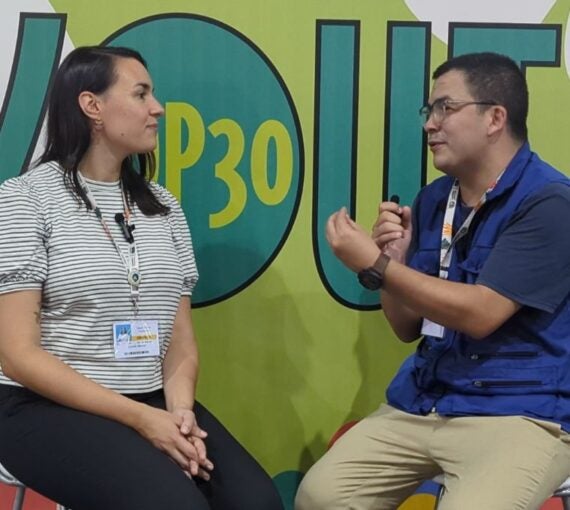 Photo: Cyrielle talks with Yorman Galviz at COP30